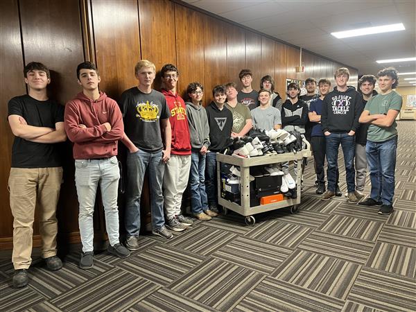 Mr. Longs Construction Trades Class Collects 44 New Pairs Of Shoes For Vets